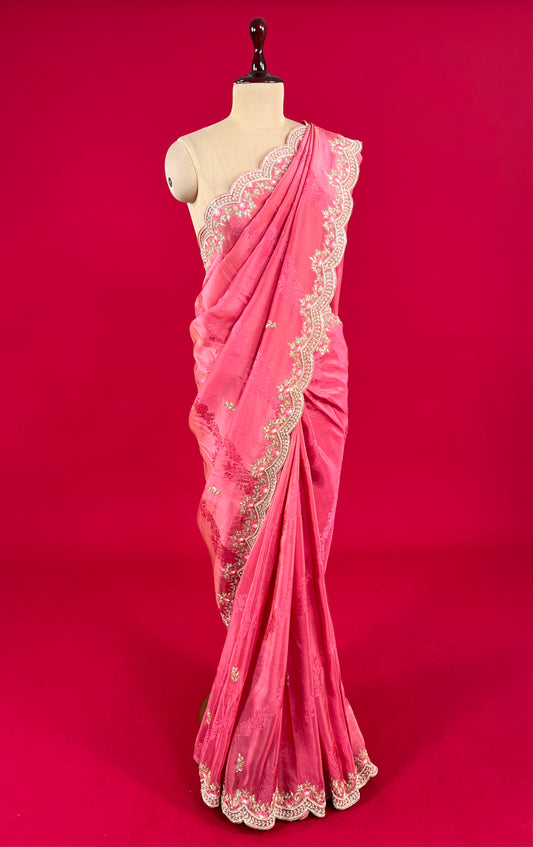 (DELIVERY IN 15-20 DAYS ) PINK COLOUR CREPE TISSUE SCALLOPED BORDER SAREE EMBELLISHED WITH CUTDANA, SEQUINS & ZARDOZI WORK