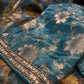 TURQUOISE COLOR CREPE TISSUE PRINTED BANARASI READYMADE BLOUSE SAREE EMBELLISHED WITH CUDANA AND SEQUINS WORK