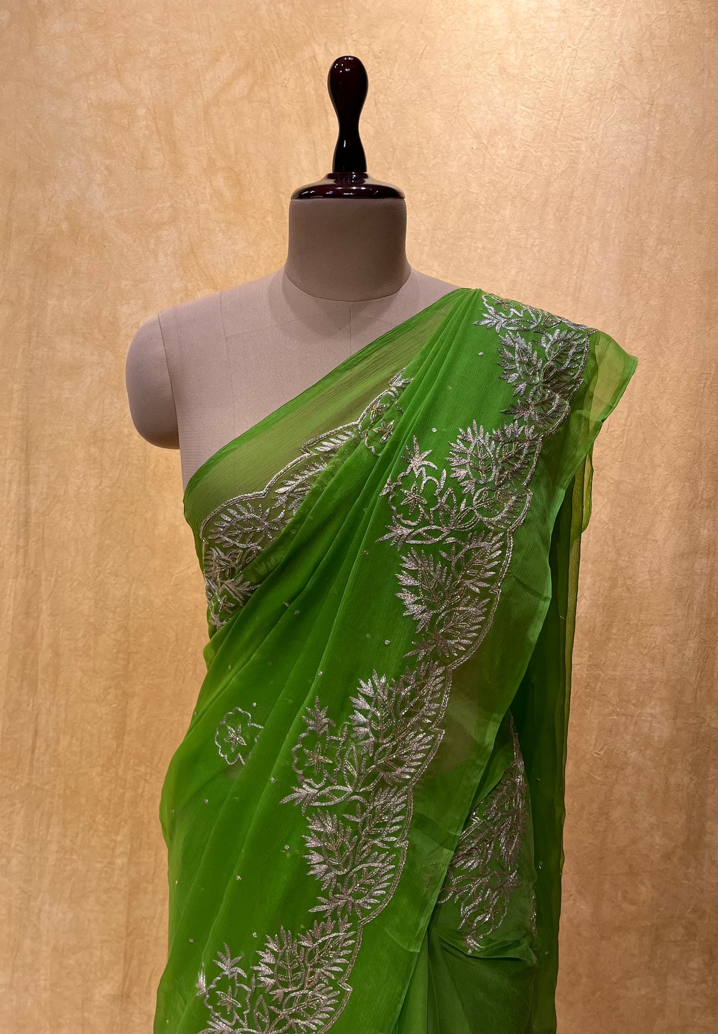 PARROT GREEN COLOUR CHIFFON HAND EMBROIDERED SAREE EMBELLISHED WITH AARI WORK