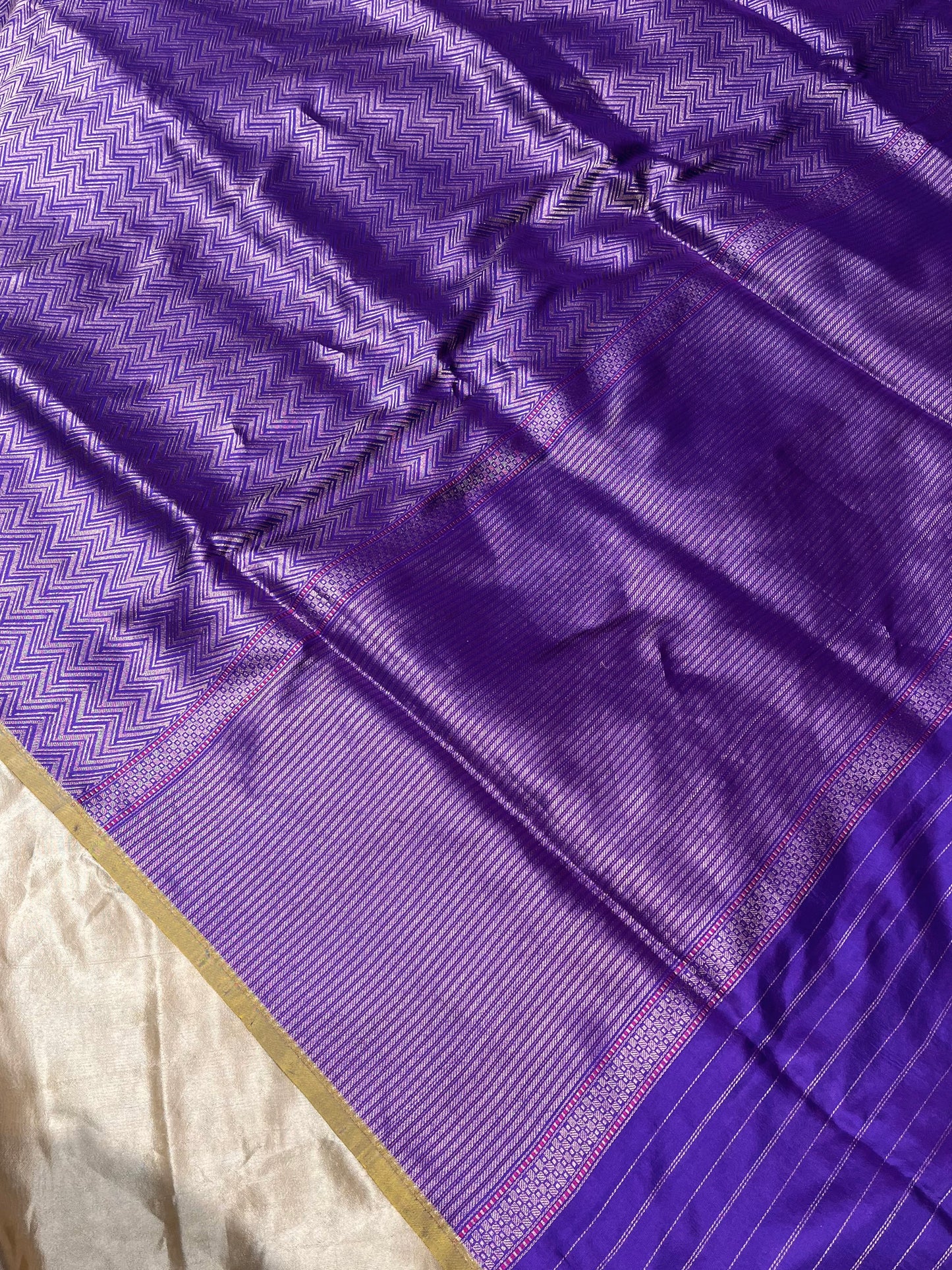 PURPLE COLOUR PURE BANARASI SILK ZIG-ZAG PATTERN SAREE EMBELLISHED WITH ZARI WEAVES