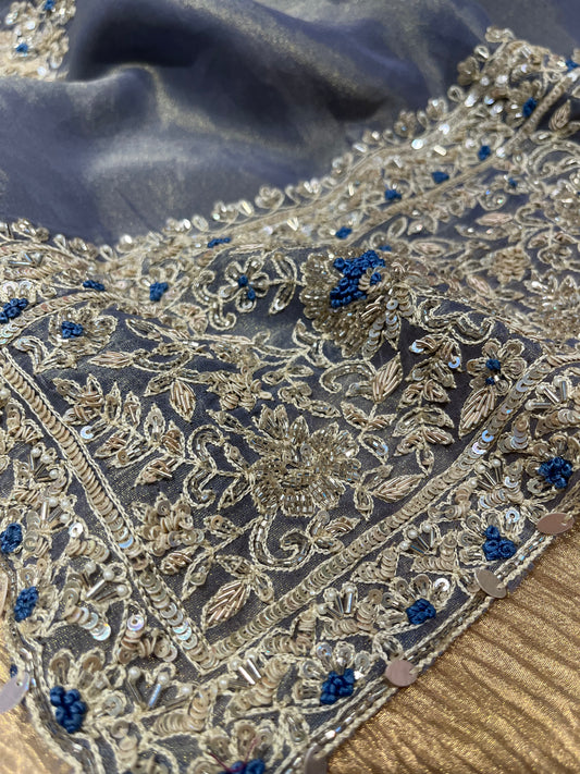 POWDER BLUE COLOR TISSUE EMBROIDERED SAREE EMBELLISHED WITH SEQUINS, CUTDANA AND PEARL WORK