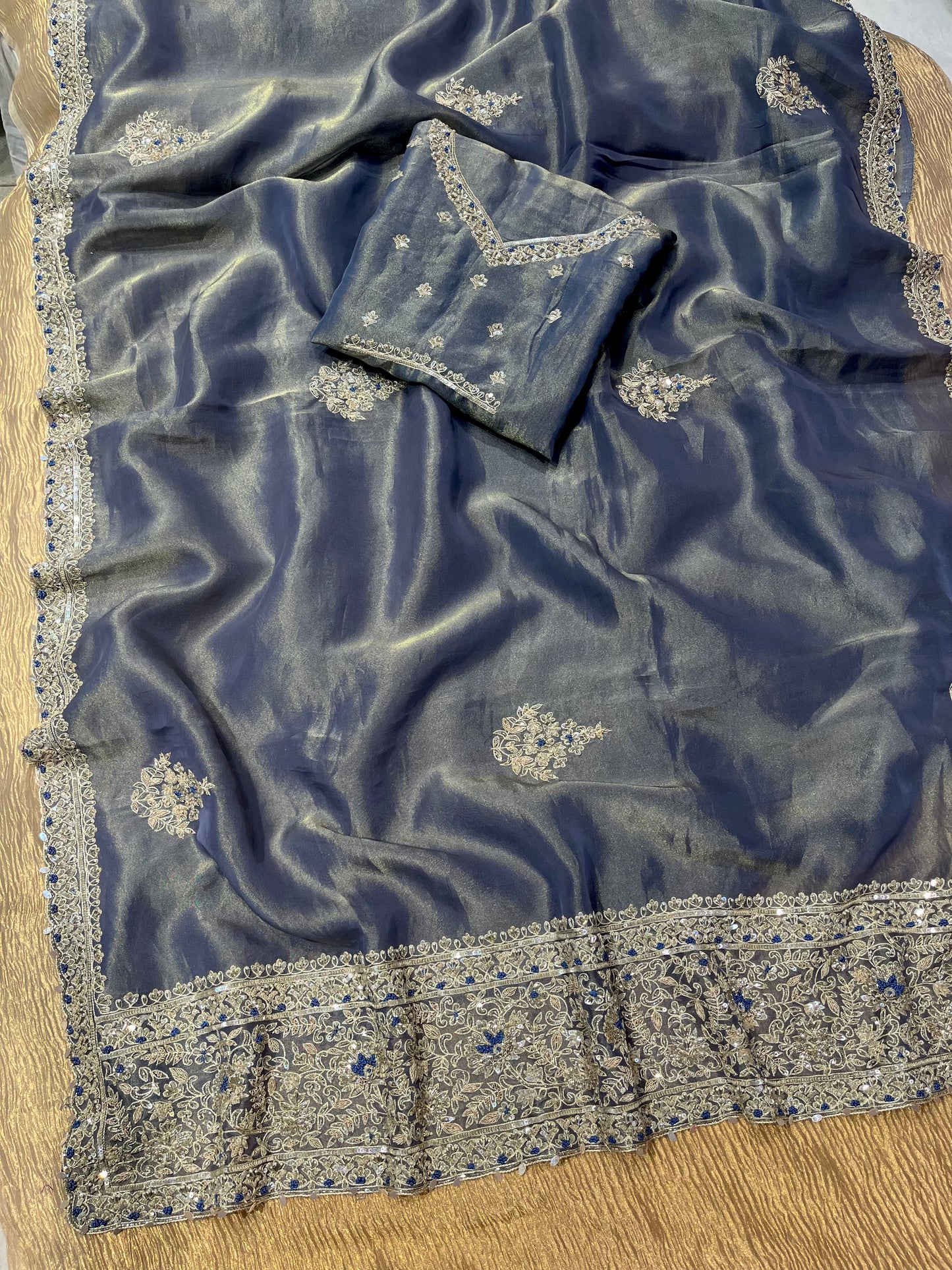 POWDER BLUE COLOR TISSUE EMBROIDERED SAREE EMBELLISHED WITH SEQUINS, CUTDANA AND PEARL WORK