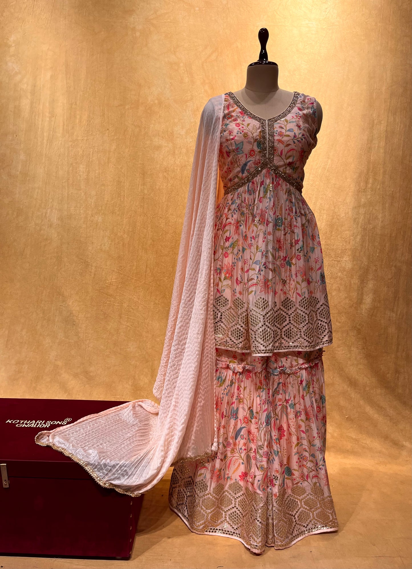 PEACH COLOUR PRINTED MUSLIN SILK EMBROIDERED SHARARA SUIT EMBELLISHED WITH GOTA PATTI WORK
