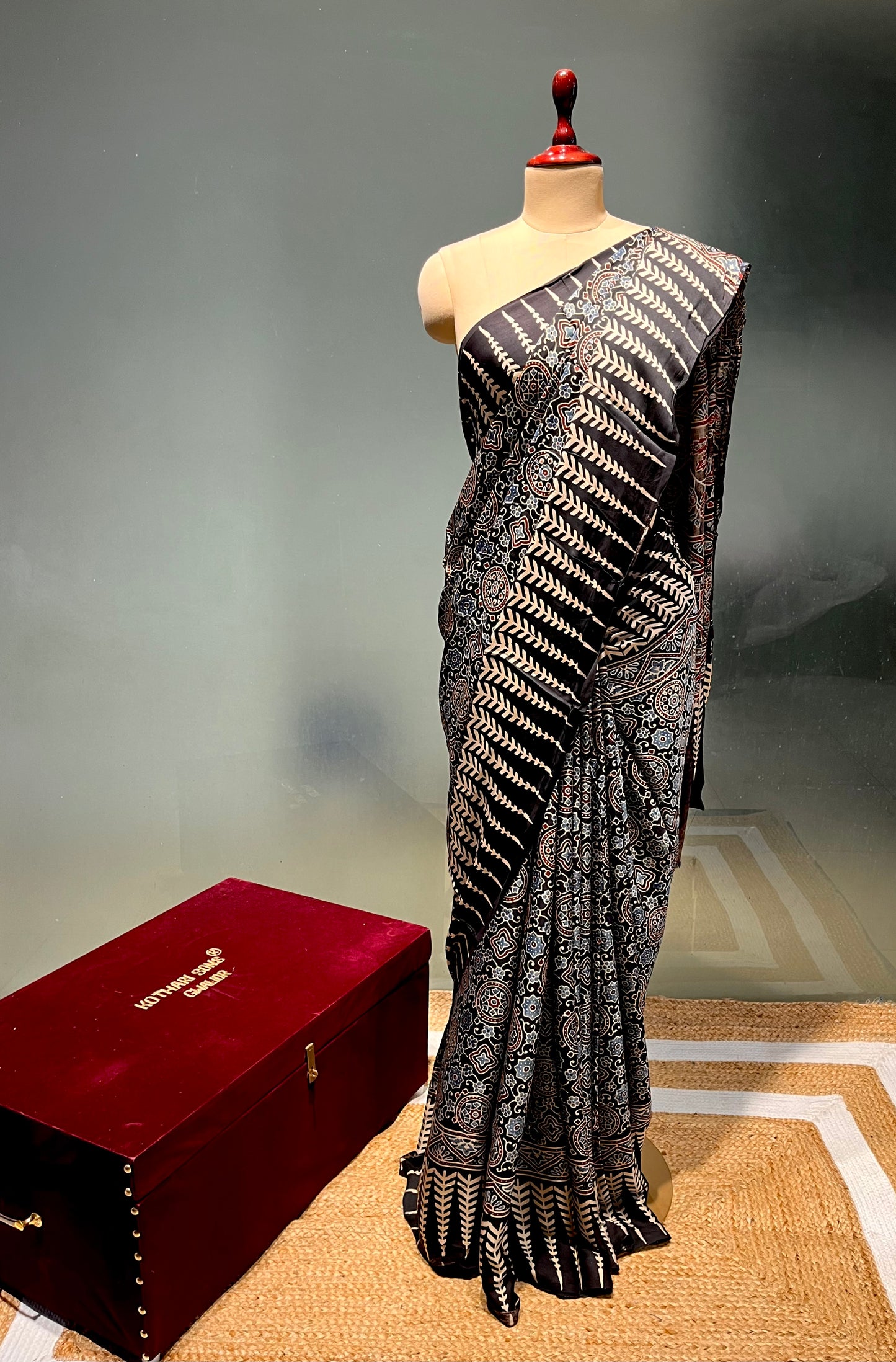 BLACK COLOUR MODAL SILK AJRAKH PRINT SAREE