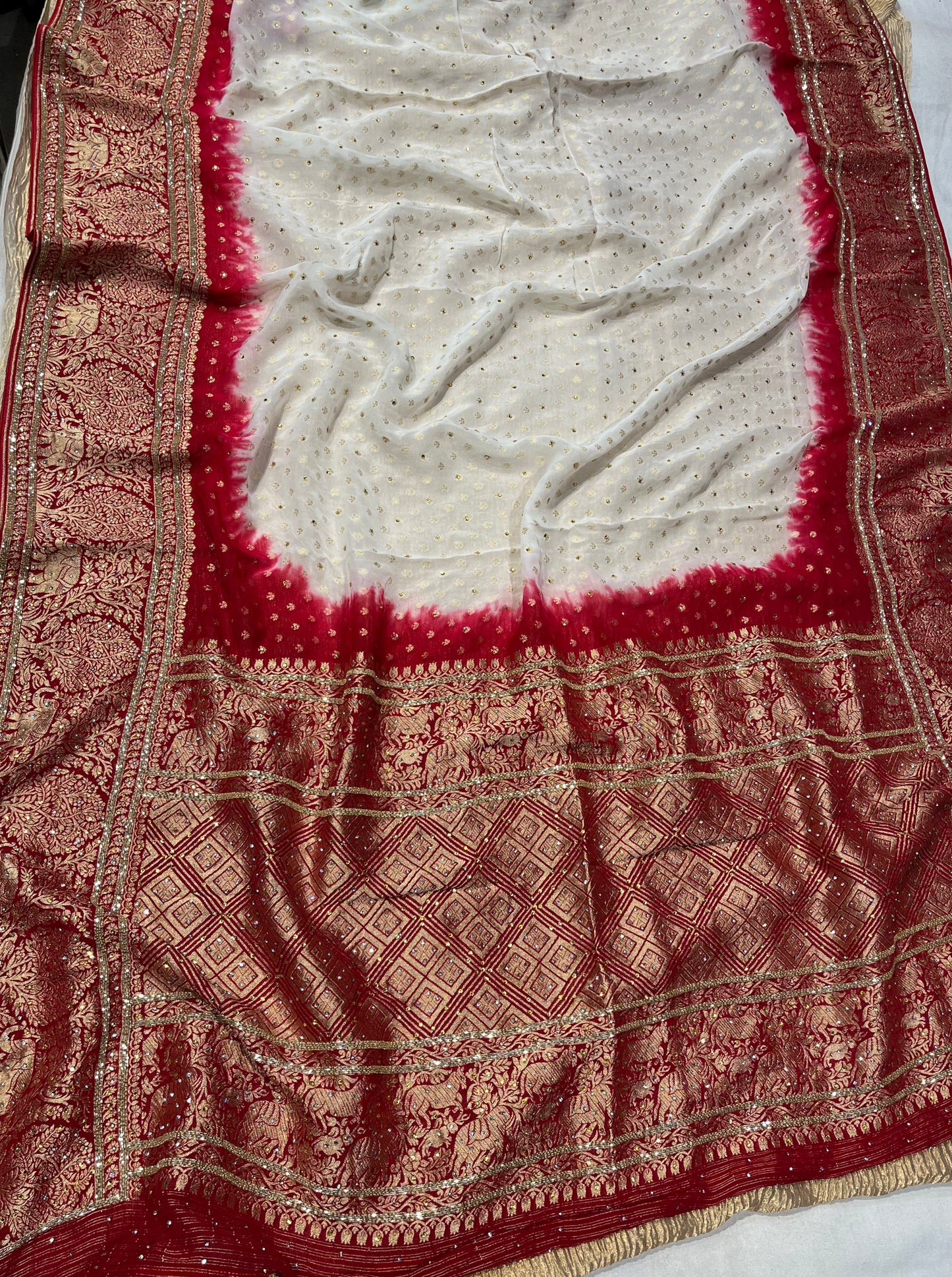 WHITE & RED COLOURS GEORGETTE KHADDI EMBROIDERED SAREE EMBELLISHED WITH CUTDANA AND ZARDOZI WORK