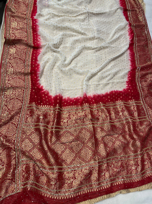 WHITE & RED COLOURS GEORGETTE KHADDI EMBROIDERED SAREE EMBELLISHED WITH CUTDANA AND ZARDOZI WORK