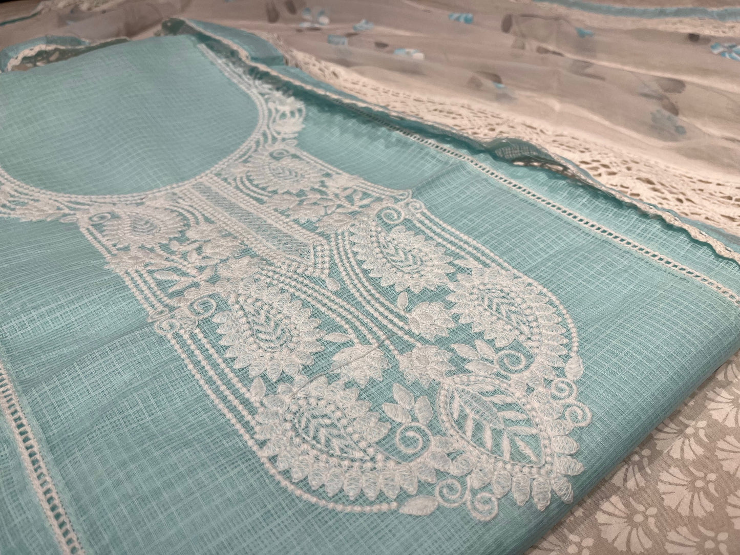 SKY BLUE KOTA DORIA UNSTITCHED SUIT WITH CHIFFON DUPATTA EMBELLISHED WITH THREAD WORK