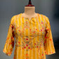 MULTI COLOURED YELLOW MUSLIN KURTI EMBELLISHED WITH MIRROR FOIL AND SEQUINS