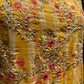 MULTI COLOURED YELLOW MUSLIN KURTI EMBELLISHED WITH MIRROR FOIL AND SEQUINS