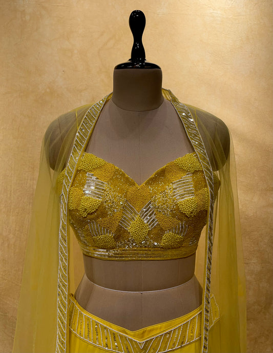 YELLOW COLOR GEORGETTE PALAZZO WITH CROP TOP & SHRUG EMBELLISHED WITH SEQUINS & CUTDANA WORK