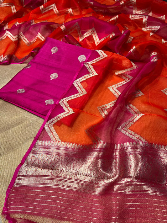 HOT PINK COLOUR PURE SILK UNSTITCHED SUIT WITH ORGANZA DUPATTA EMBELLISHED WITH ZARI WEAVES