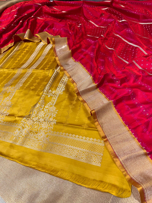 YELLOW COLOUR PURE SILK UNSTITCHED SUIT WITH CONTRAST DUPATTA EMBELLISHED WITH ZARI BORDER