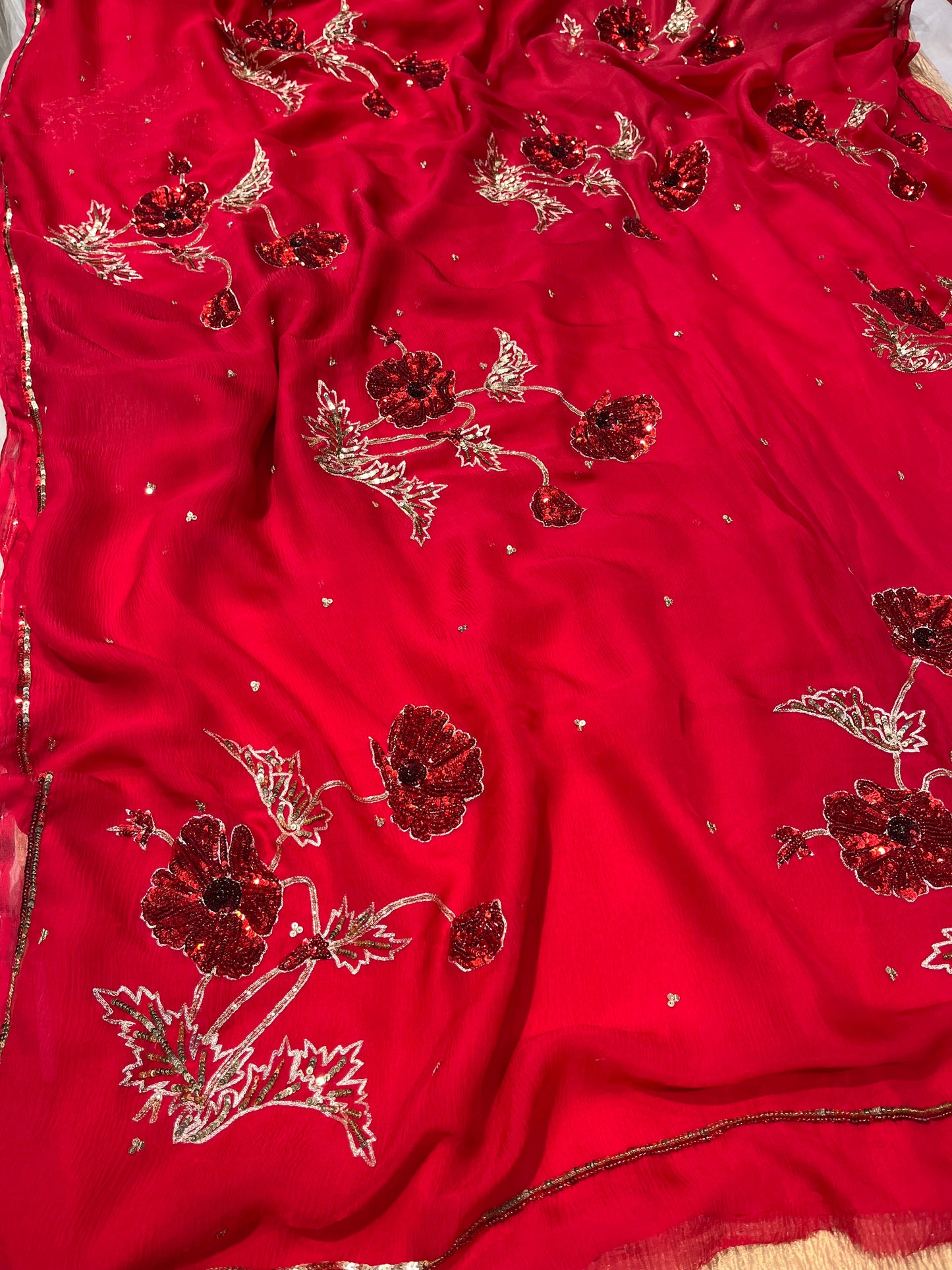 RED COLOUR PURE CHIFFON HAND EMBROIDERED SAREE WITH CREPE BLOUSE EMBELLISHED WITH SEQUINS & AARI WORK