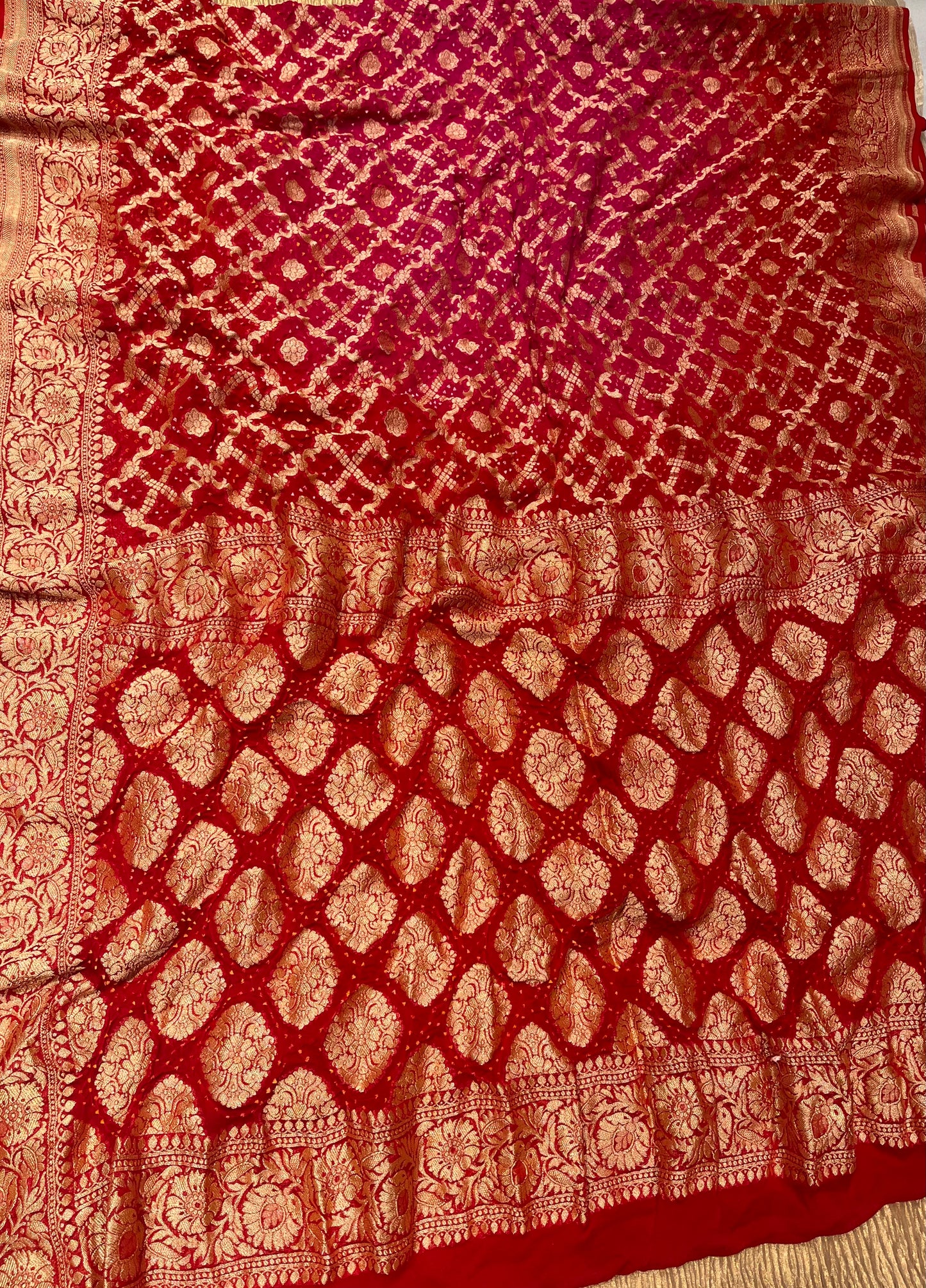 PINK & RED COLOUR SHADED PURE GEORGETTE KHADDI SAREE WITH BANDHANI PRINT EMBELLISHED WITH ANTIQUE ZARI WEAVES