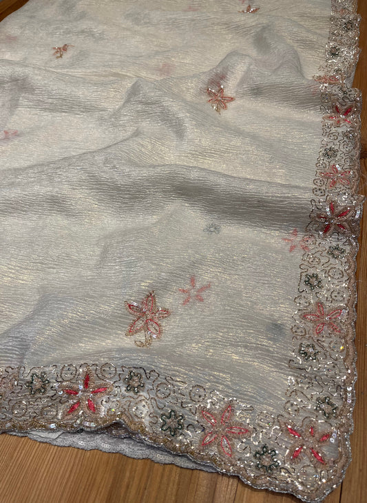 WHITE COLOUR CRUSHED TISSUE EMBROIDERED SAREE EMBELLISHED WITH SEQUINS & CUTDANA WORK