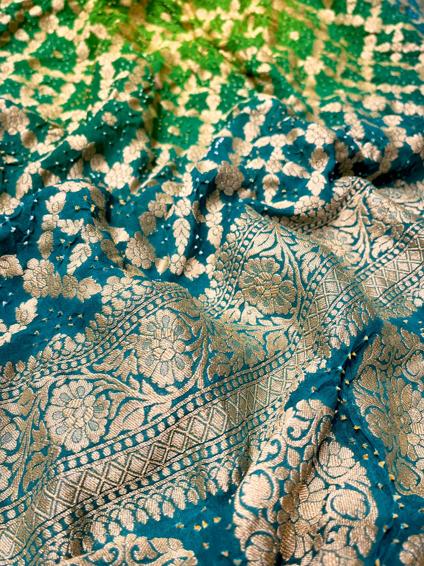 TURQUOISE & GREEN COLOUR SHADED PURE GEORGETTE KHADDI SAREE WITH BANDHANI PRINT EMBELLISHED WITH ANTIQUE ZARI WEAVES