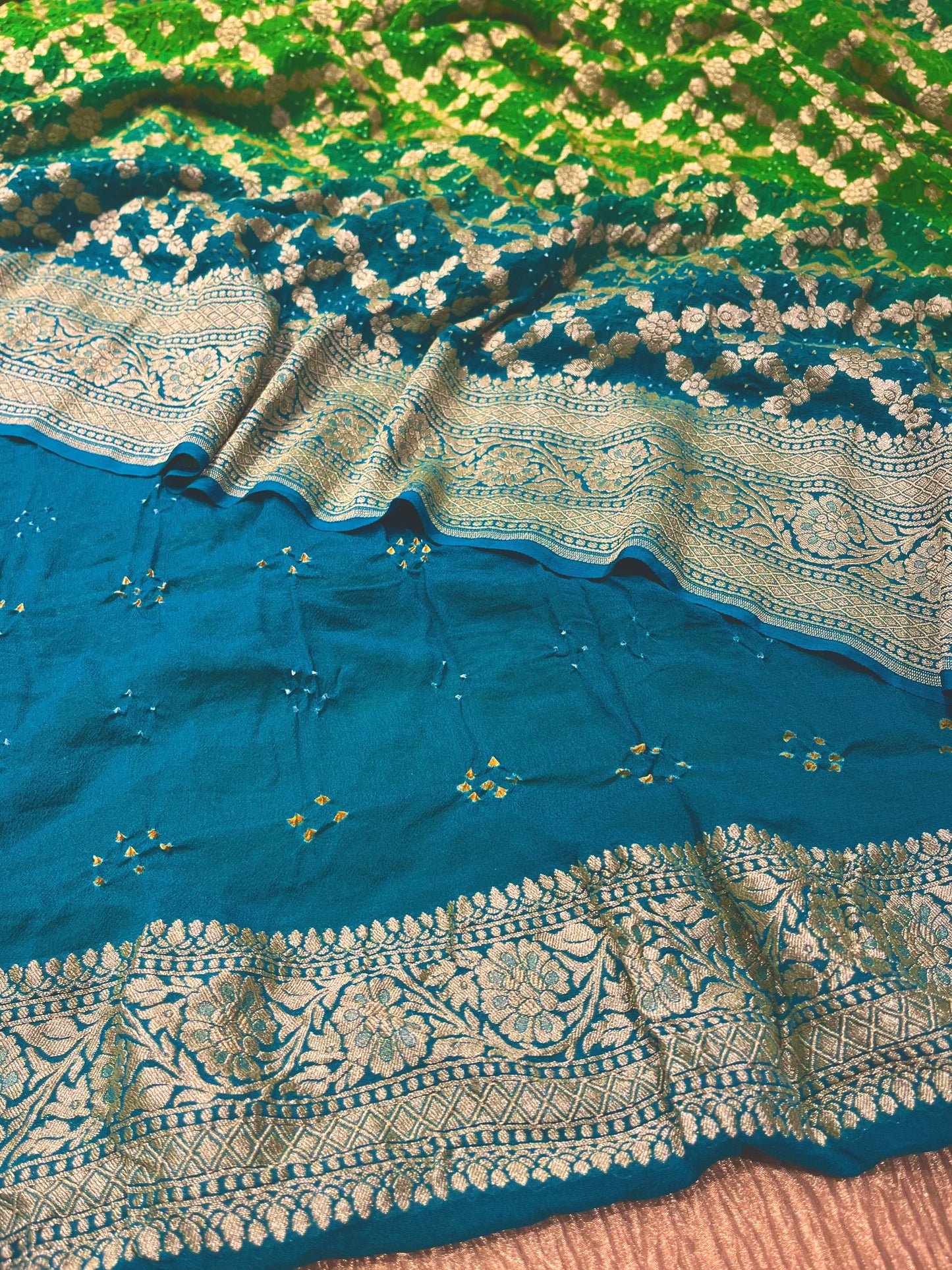 TURQUOISE & GREEN COLOUR SHADED PURE GEORGETTE KHADDI SAREE WITH BANDHANI PRINT EMBELLISHED WITH ANTIQUE ZARI WEAVES