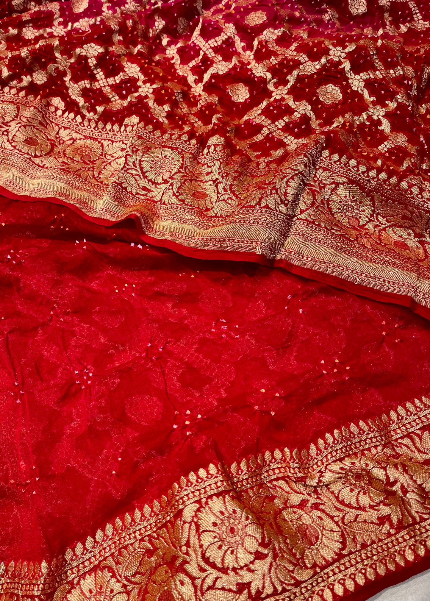 PINK & RED COLOUR SHADED PURE GEORGETTE KHADDI SAREE WITH BANDHANI PRINT EMBELLISHED WITH ANTIQUE ZARI WEAVES