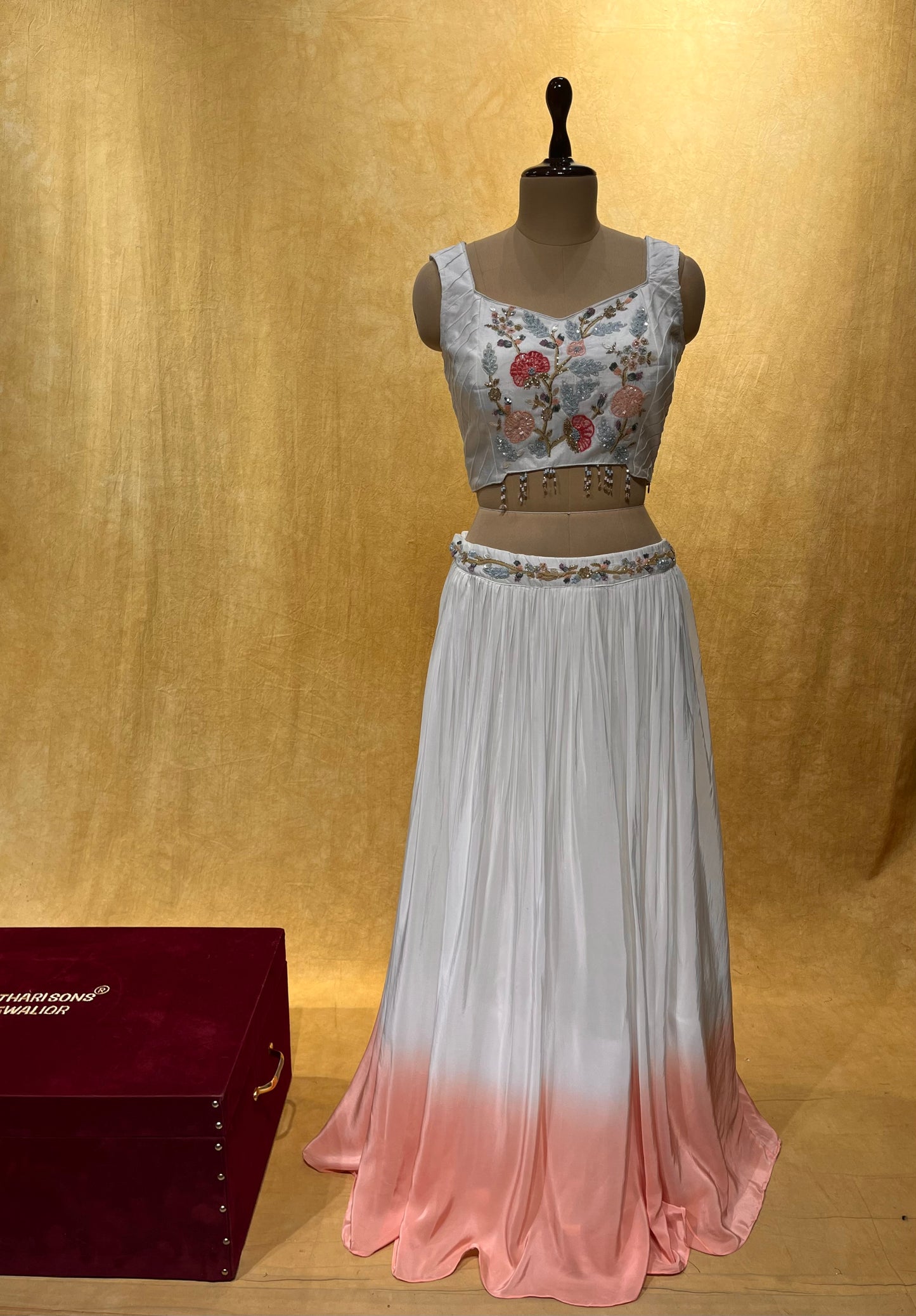 WHITE COLOR LONG CREPE SILK SKIRT WITH CROP TOP BLOUSE & ORGANZA SHRUG EMBELLISHED WITH SEQUINS & CUTDANA WORK