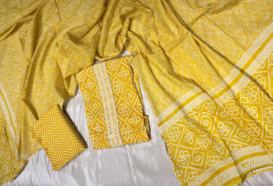 YELLOW COLOUR COTTON UNSTITCHED BANDHANI SUIT