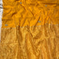 MUSTARD COLOUR CHANDERI TISSUE HAND EMBROIDERED SAREE EMBELLISED WITH ZARDOZI WORK