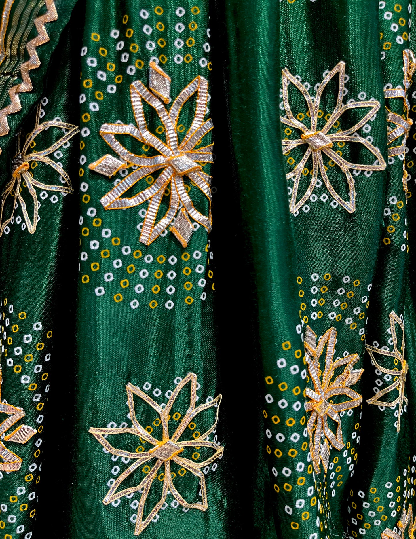 BOTTLE GREEN COLOUR GAJJI SILK BANDHANI LEHENGA WITH UNSTITCHED BLOUSE EMBELLISHED WITH GOTA PATTI WORK - Kothari Sons