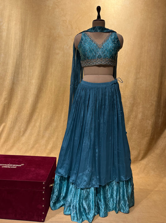 SKY BLUE COLOR CHINON LEHENGA WITH CROP TOP BLOUSE EMBELLISHED WITH ZARI WORK