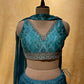 SKY BLUE COLOR CHINON LEHENGA WITH CROP TOP BLOUSE EMBELLISHED WITH ZARI WORK