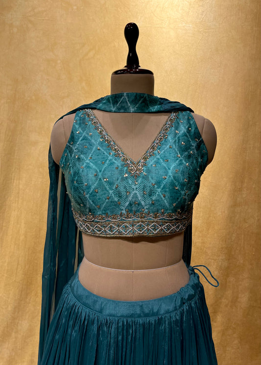 SKY BLUE COLOR CHINON LEHENGA WITH CROP TOP BLOUSE EMBELLISHED WITH ZARI WORK