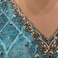 SKY BLUE COLOR CHINON LEHENGA WITH CROP TOP BLOUSE EMBELLISHED WITH ZARI WORK