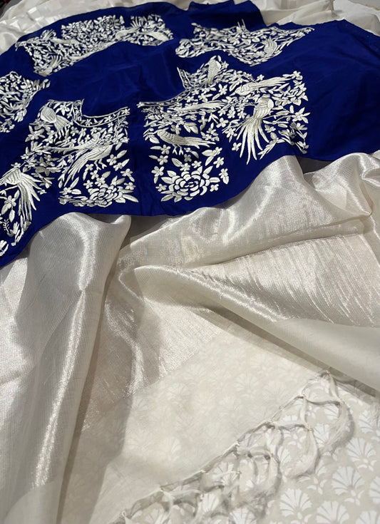 (DELIVERY IN 25 DAYS) WHITE COLOUR CHANDERI SAREE WITH HAND EMBROIDERED PARSI WORK CREPE SILK BLOUSE
