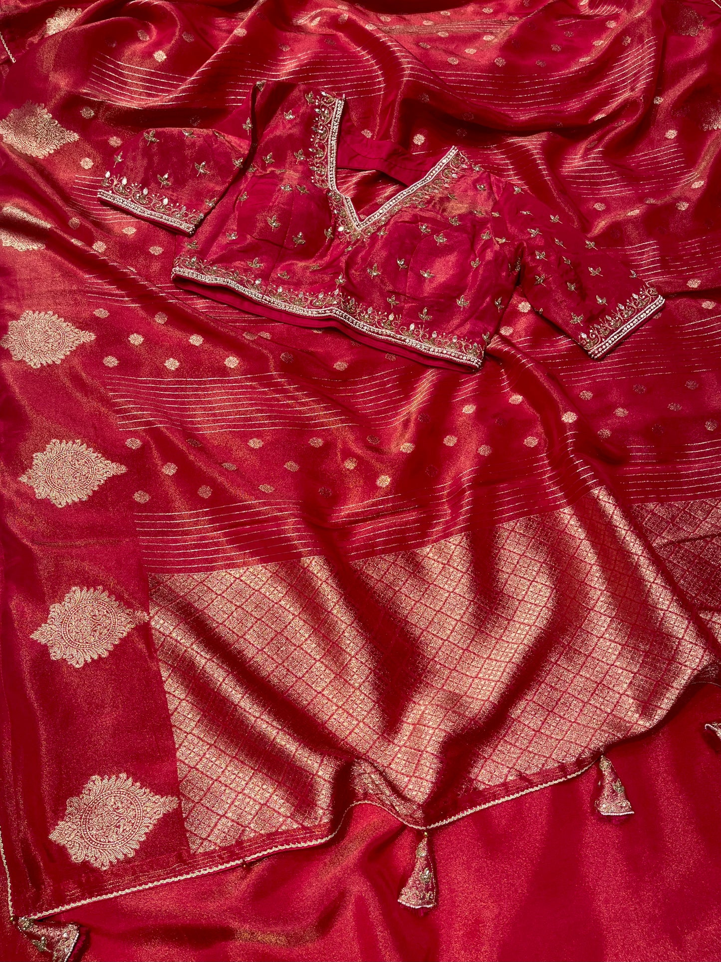 RED DOLA TISSUE SILK SAREE WITH PEARL & CUTDANA EMBELLISHED READYMADE BLOUSE