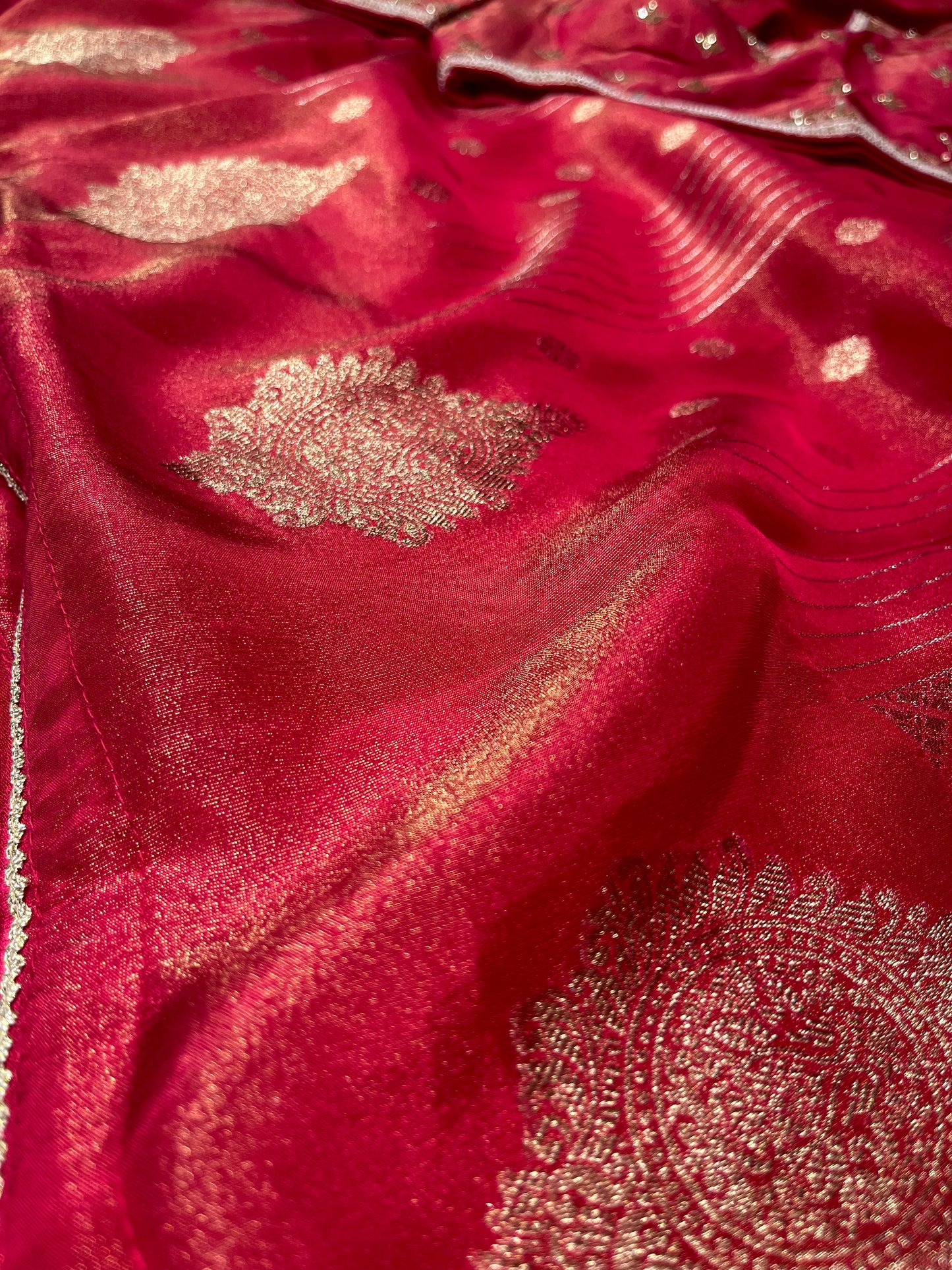 RED DOLA TISSUE SILK SAREE WITH PEARL & CUTDANA EMBELLISHED READYMADE BLOUSE
