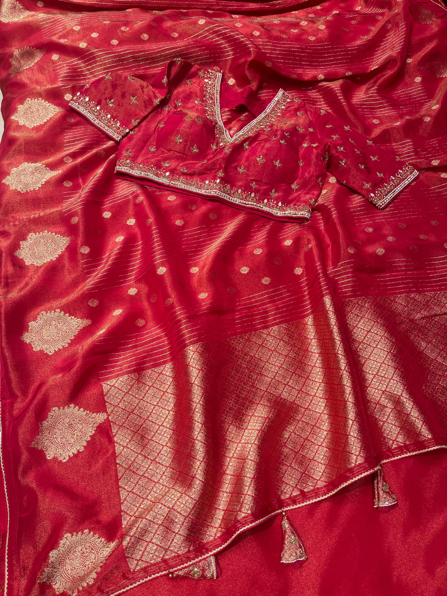 RED DOLA TISSUE SILK SAREE WITH PEARL & CUTDANA EMBELLISHED READYMADE BLOUSE