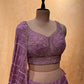 LEVANDER COLOR CHINON LEHENGA WITH CROP TOP BLOUSE EMBELLISHED WITH CUTDANA, ZARDOZI & SEQUINS WORK