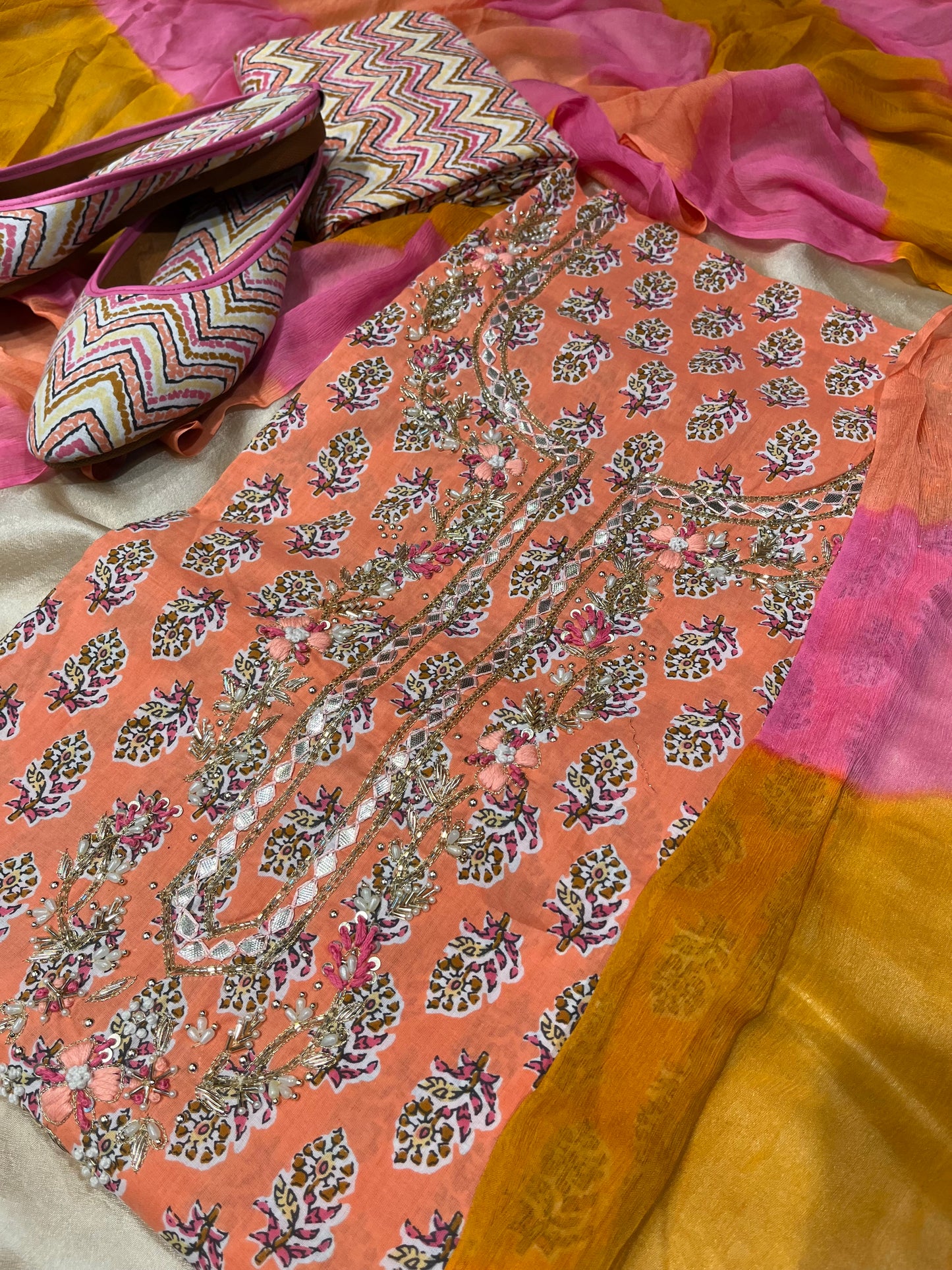 PEACH COLOUR COTTON UNSTITCHED SUIT WITH CHIFFON DUPATTA & JUTTI