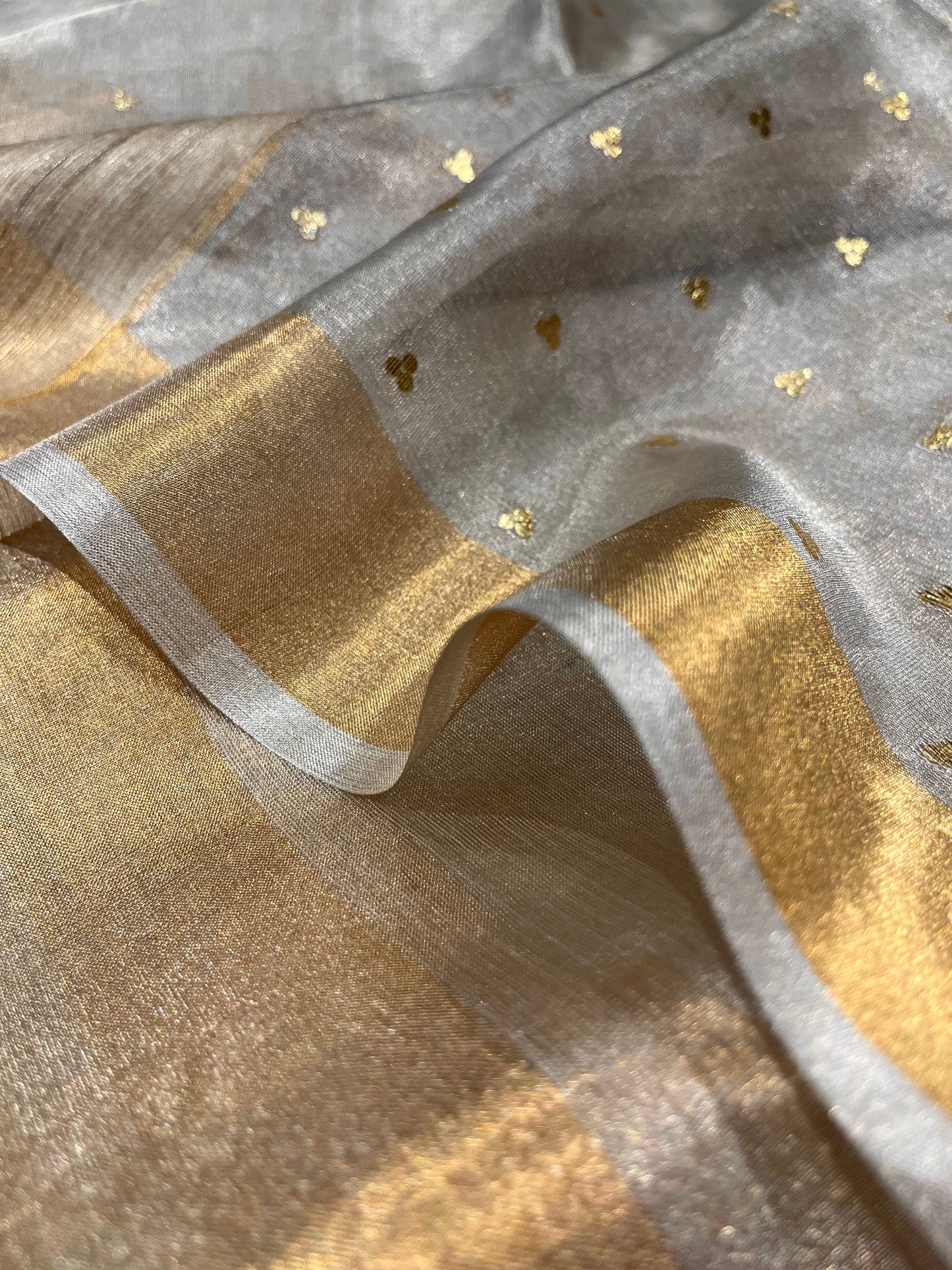 SILVER TISSUE SAREE WITH SEQUINS WEAVE & GOLDEN ZARI BORDER