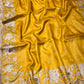 MUSTARD COLOUR TUSSAR  EMBROIDERED SARRE WITH PRINTED BLOUSE EMBELLISHED WITH RESHAM WORK