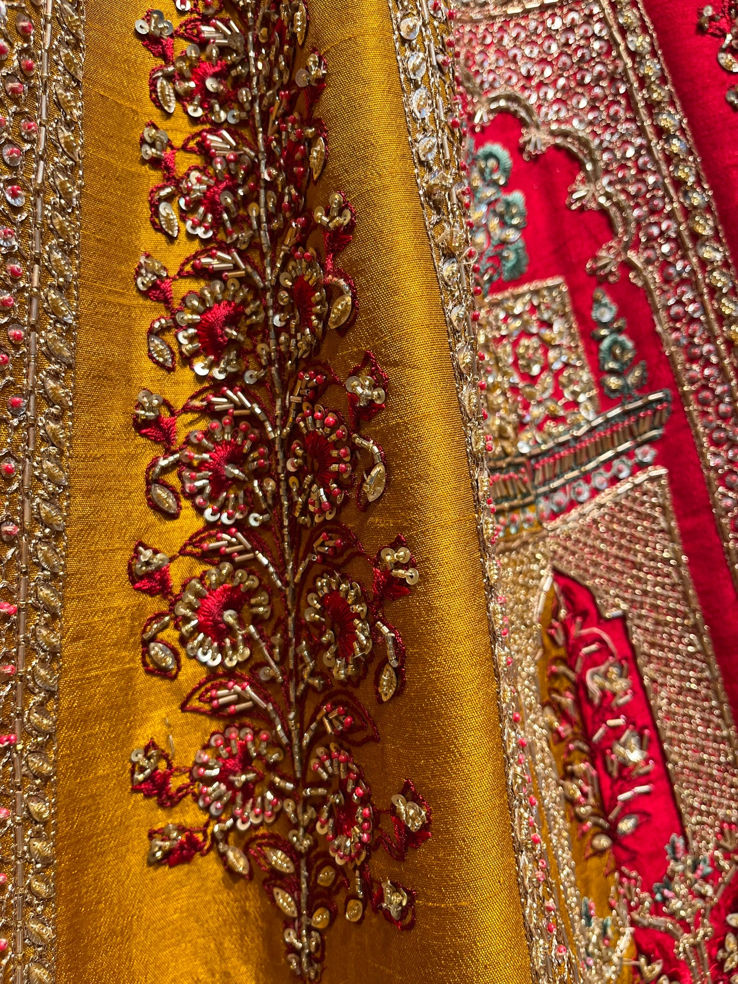 MULTI COLOUR RANGKAT PURE SILK HAND EMBROIDERED BRIDAL LEHENGA EMBELLISHED WITH CUTDANA, SEQUINS & RESHAM WORK