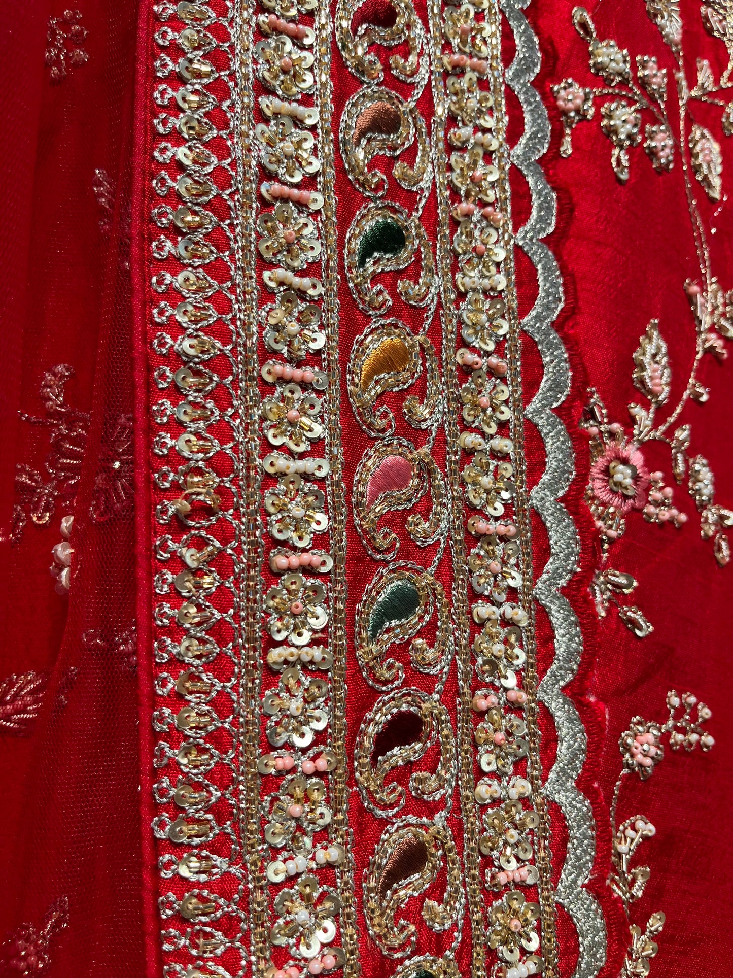 RED COLOUR PURE SILK HAND EMBROIDERED BRIDAL LEHENGA WITH NET DUPATTA EMBELLISHED WITH ZARDOZI, CUTDANA & SEQUINS WORK