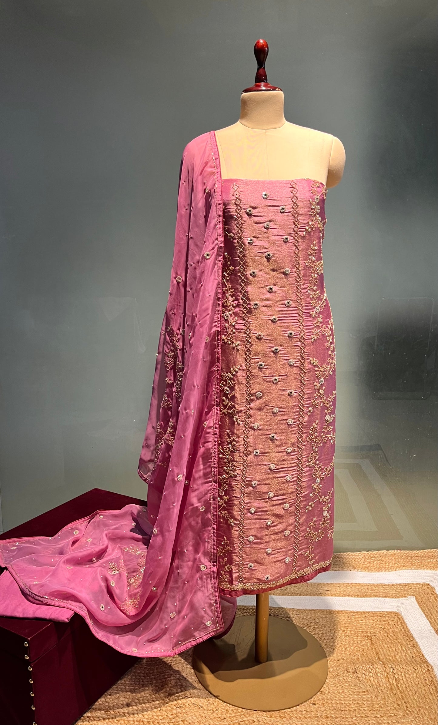 PINK COLOUR CREPE TISSUE UNSTITCHED SUIT WITH ORGANZA DUPATTA EMBELLISHED WITH SEQUINS, CUTDANA & MIRROR WORK