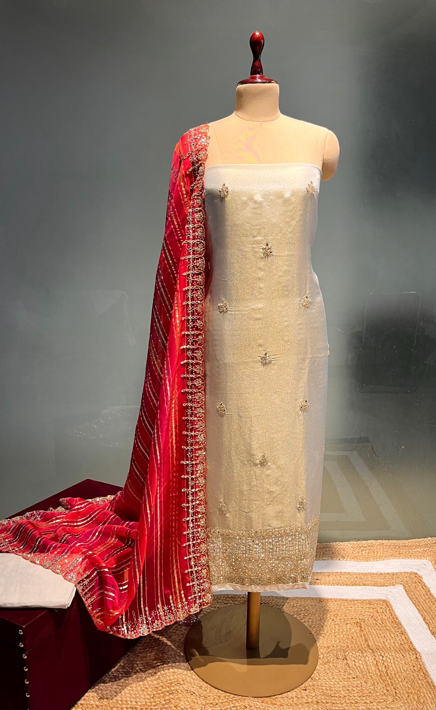 IVORY COLOUR CREPE TISSUE UNSTITCHED SUIT WOTH ORGANZA DUPATTA DMBELLISHED WITH CUTDANA WORK