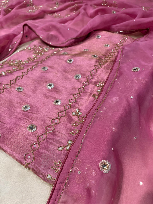 PINK COLOUR CREPE TISSUE UNSTITCHED SUIT WITH ORGANZA DUPATTA EMBELLISHED WITH SEQUINS, CUTDANA & MIRROR WORK