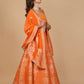 ORANGE BANARASI LEHENGA WITH DUPATTA AND MONOTONE BLOUSE
