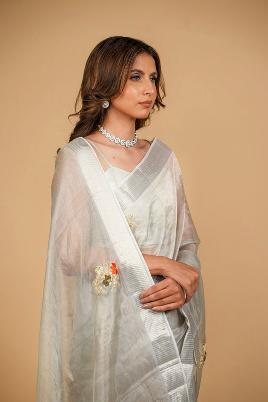 MACLENO WEAVE SILVER SAREE WITH BEADS AND ZARDOZI WORK