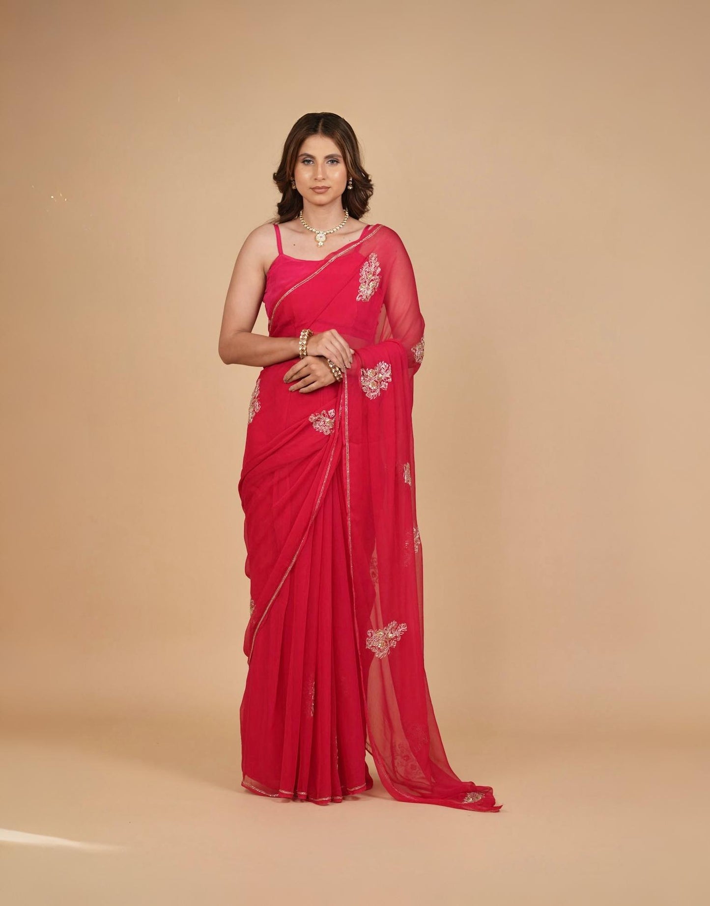 RASPBERRY PINK CHIFFON SAREE WITH HAND EMBROIDERED MOTIFS