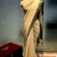 IVORY COLOUR GEORGETTE KHADDI SAREE WITH CONTRAST BORDER EMBELLIWITH ZARI WEAVES