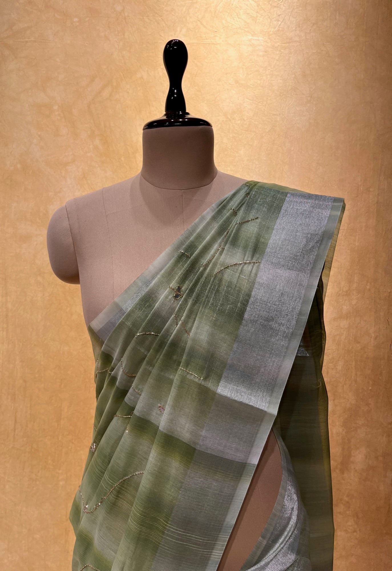 PASTEL GREEN COLOUR COTTON TISSUE EMBROIDERED SAREE EMBELLISHED WITH CUTDANA WORK