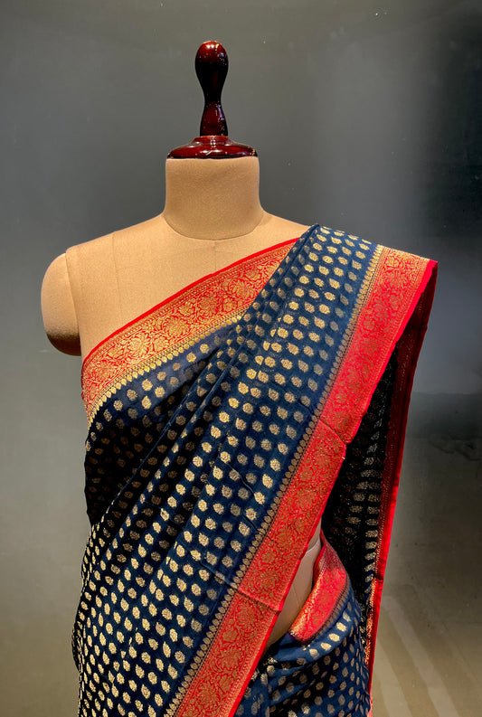 TEAL BLUE COLOUR GEORGETTE KHADDI SAREE WITH CONTRAST BORDER & PALLA EMBELLISHED WITH ZARI WEAVES