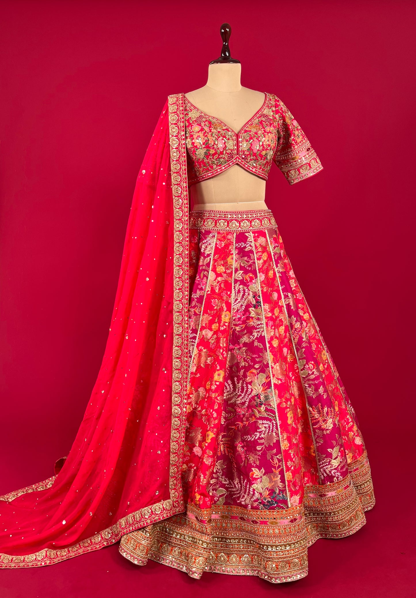 ( DELIVERY IN 15-20 DAYS ) HOT PINK & PURPLE COLOUR SILK LEHENGA WITH EMBROIDERED BLOUSE & ORGANZA DUPATTA EMBELLISHED WITH SEQUINS & ZARI WORK